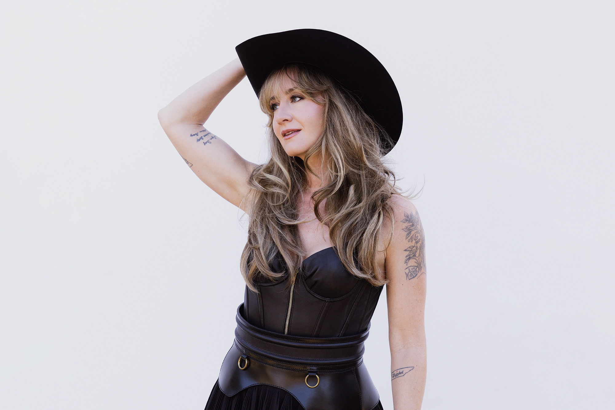 Margo Price in a cowboy hat