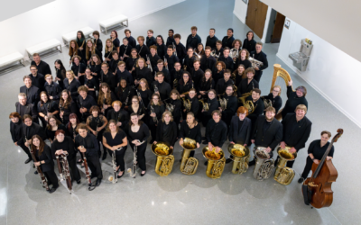 Appalachian Symphony Band posing in Schaefer Center lobby