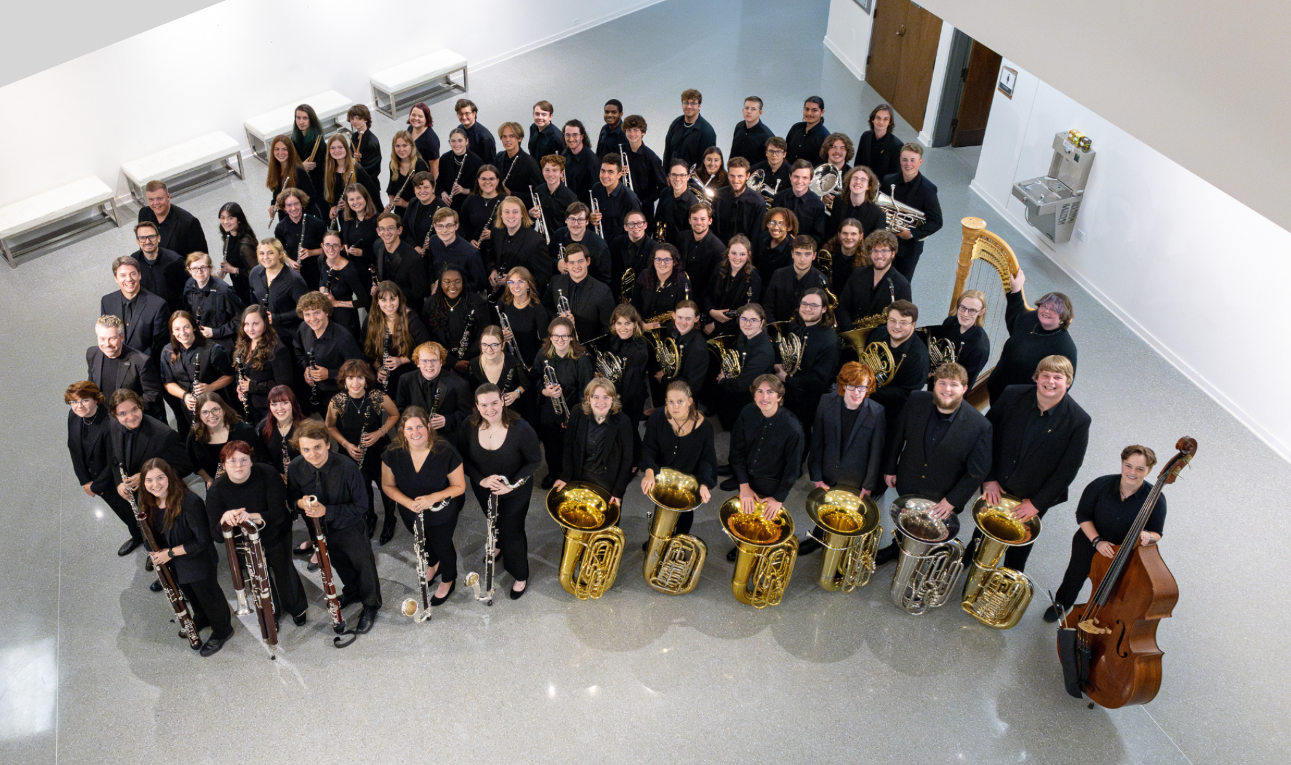 Appalachian Symphony Band posing in Schaefer Center lobby