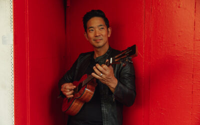 Jake Shimabukuro holding a ukelele