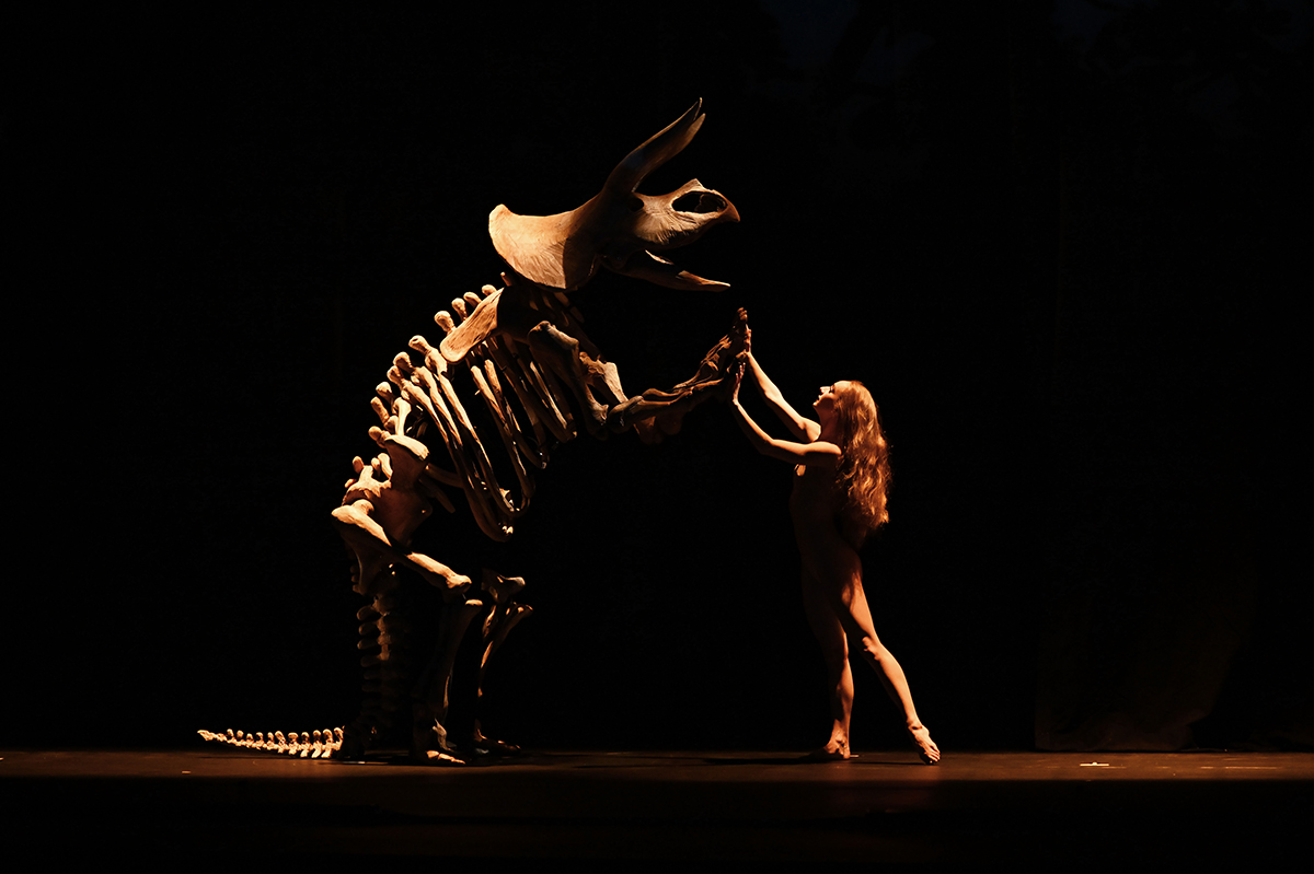 Dancer with Triceratops performing in MOMIX: Botanica