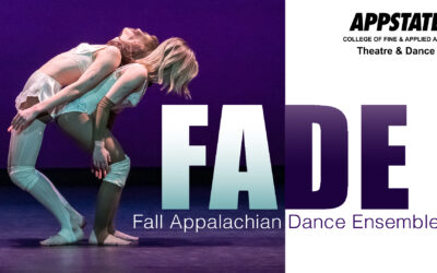 Two dancers with long hair, back to back, representing the fall dance performance