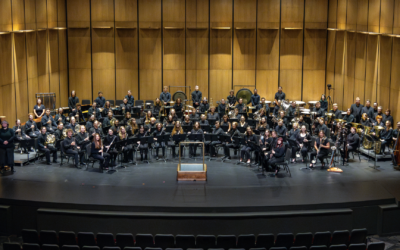 The Appalachian Symphony band posing on the Schaefer Center stage